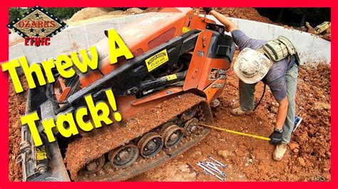 thrown track on a skid steer|How To Fix A Thrown Track .